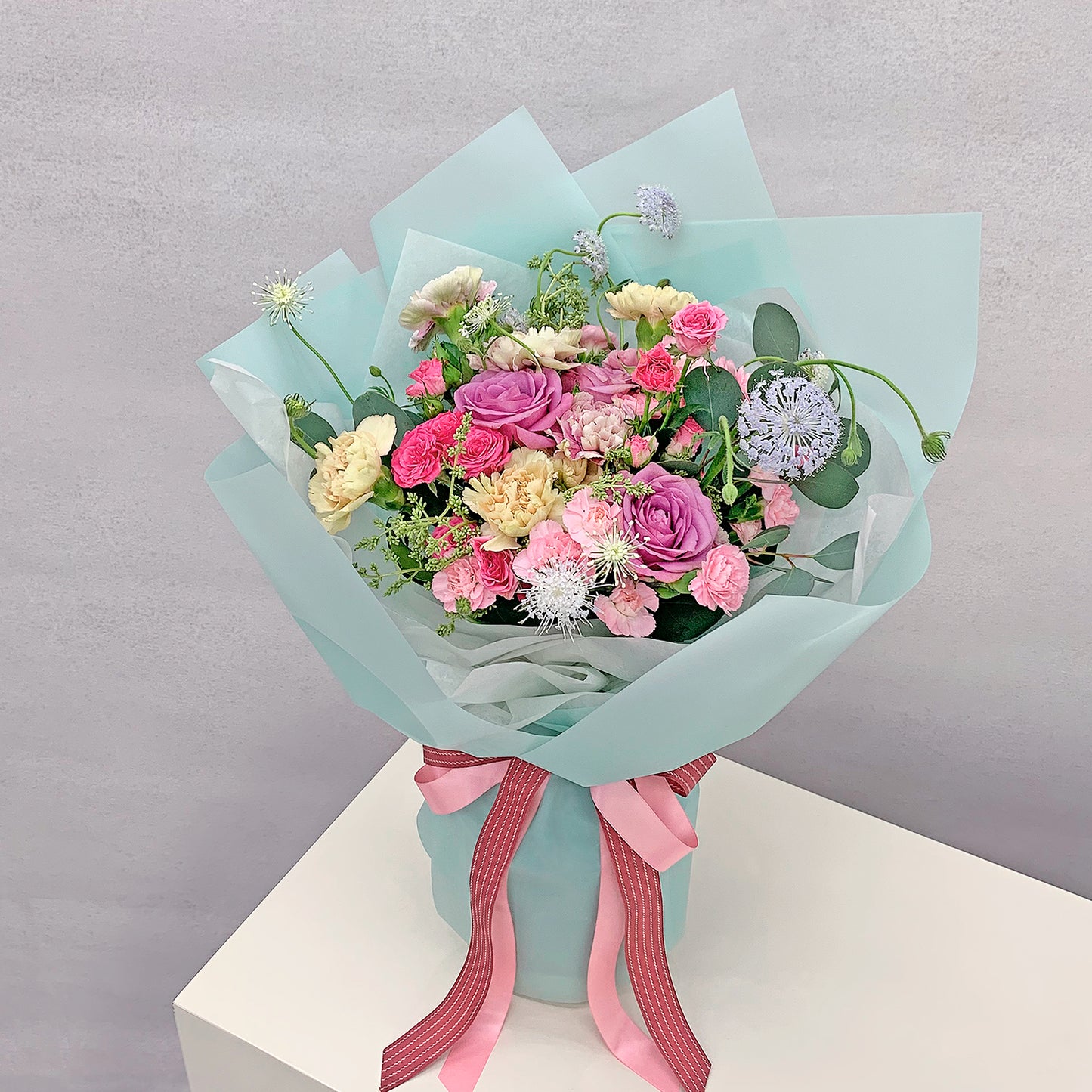 Lightest Breath Seasonal Hand Bouquet